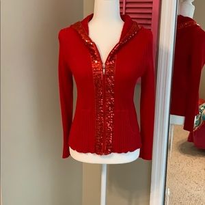 Red hot sequined, ribbed knit top by Fontana.